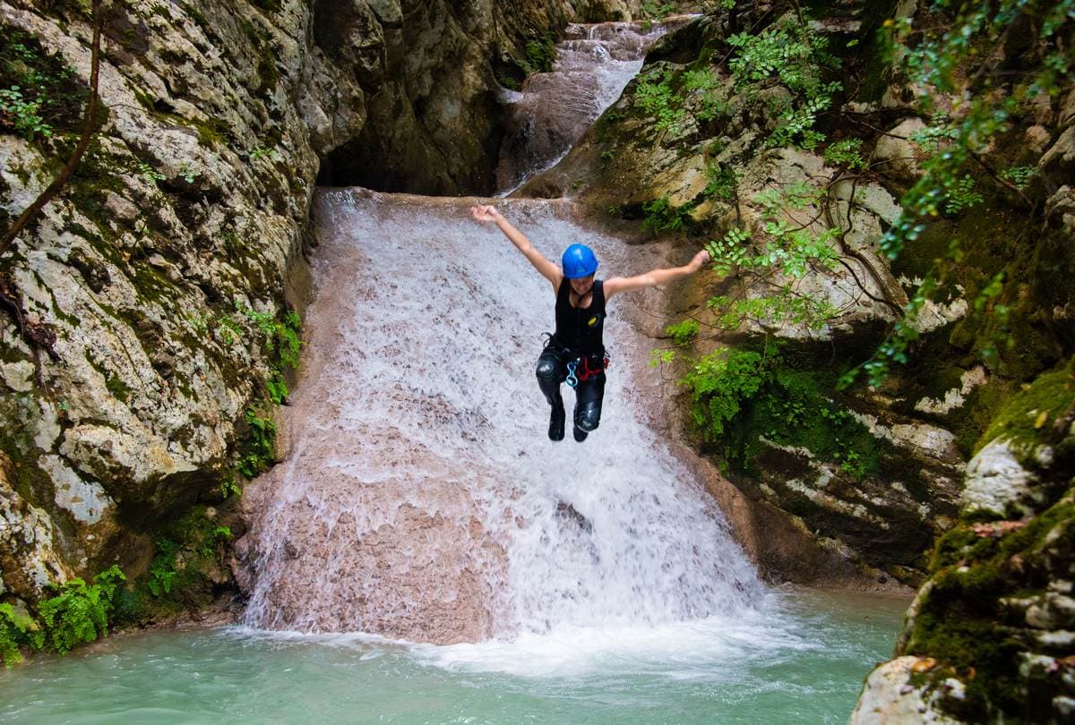 A stunning view of the Neda Waterfalls in Greece, the primary destination for our guided river tours and activities.