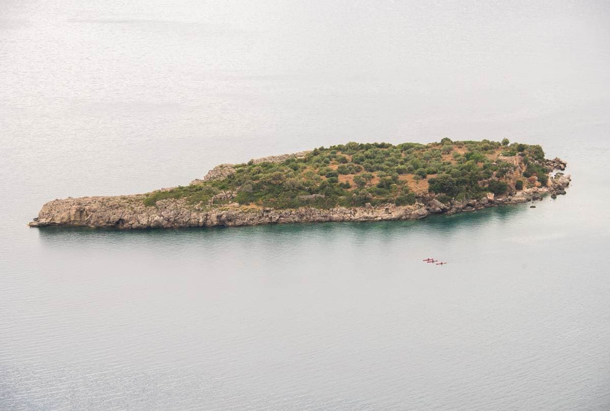 Aerial view of Meropi Island near the coast of Kardamyli in the Messinian Gulf.