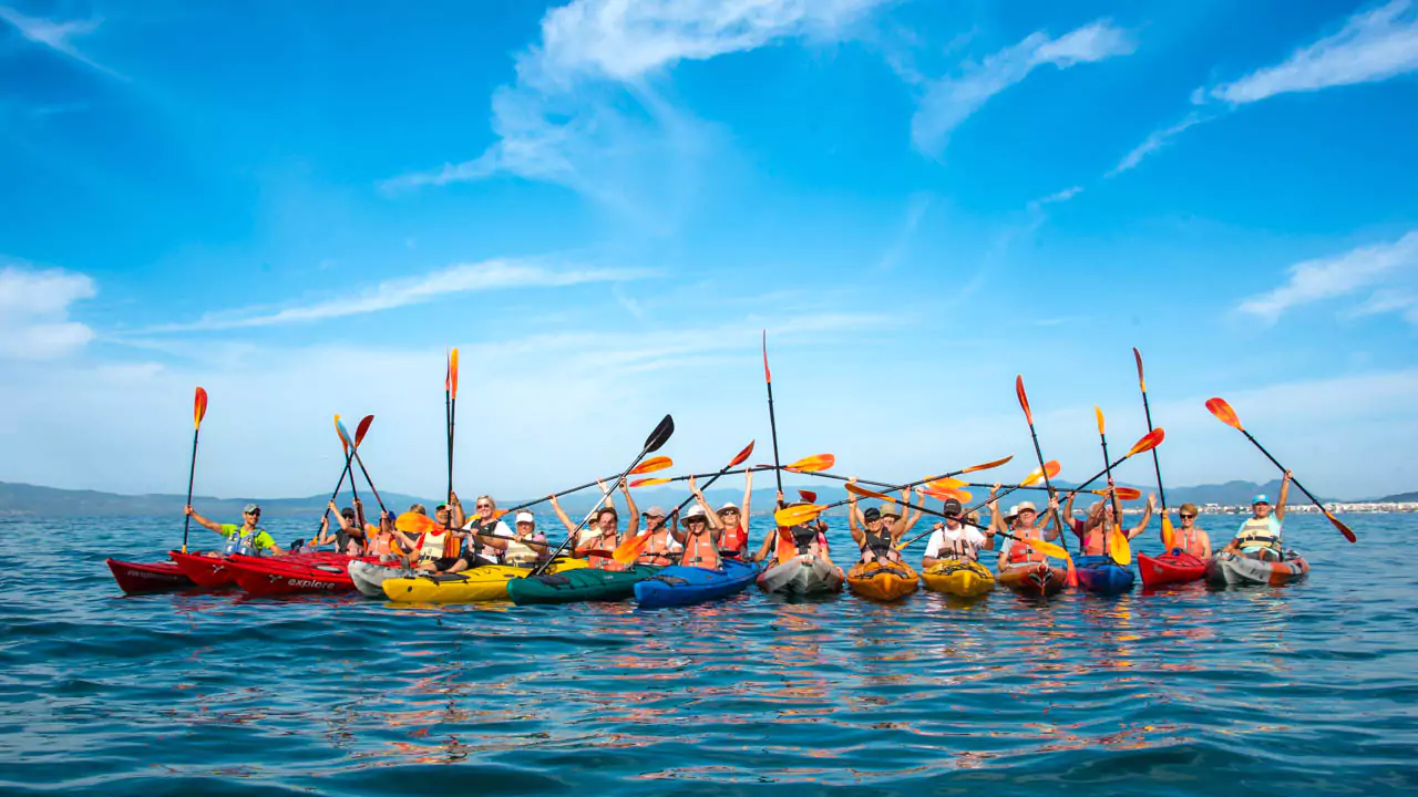 Explore Messinia-Having fun in the middle of a Kalamata sea kayak tour in a perfect day with blue waters and sky