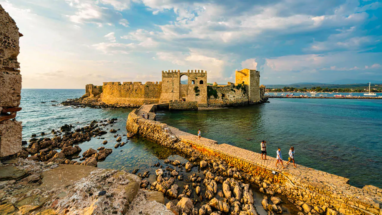 Explore Messinia-Methoni’s medieval castle radiates golden hues as the sun dips behind its Bourtzi, casting reflections on the gentle waves below. Explore Messinia-Methoni’s medieval castle radiates golden hues as the sun dips behind its Bourtzi, casting reflections on the gentle waves below.