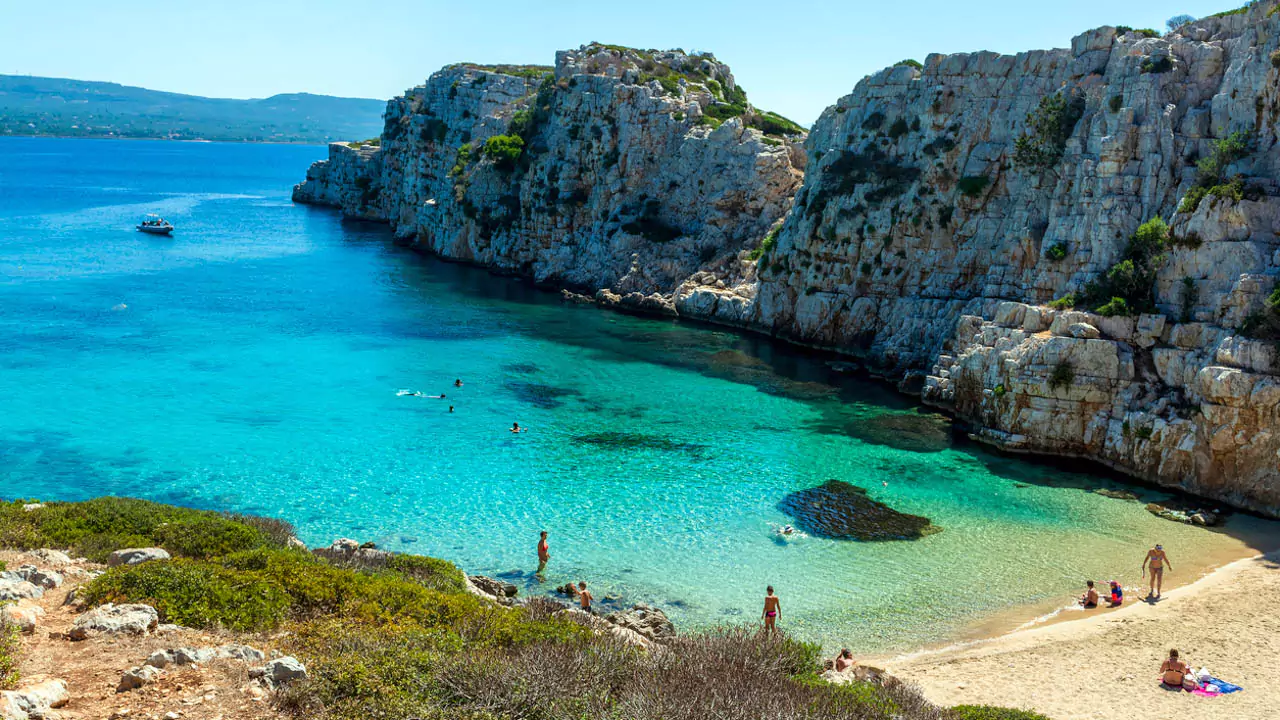 Explore Messinia-A gem of serenity, Proti Island’s secluded beach sparkles with soft sand and crystal-clear turquoise waves, untouched by time. Explore Messinia-A gem of serenity, Proti Island’s secluded beach sparkles with soft sand and crystal-clear turquoise waves, untouched by time.